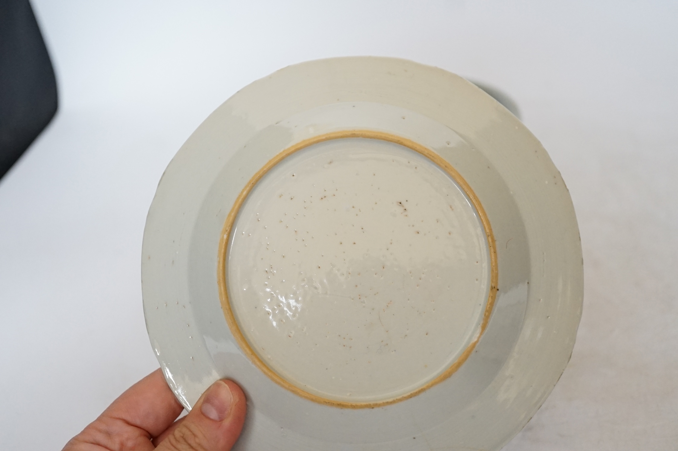 A Chinese Ming blue and white bowl and two Qing dynasty dishes, largest 17cm diameter